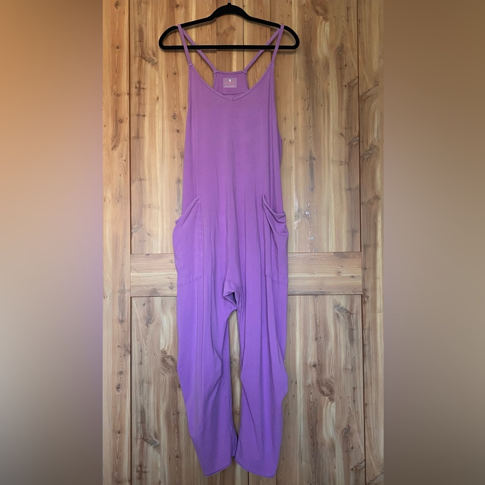 •F R E E.. P E O P L E.. Hot shot Onesie•
